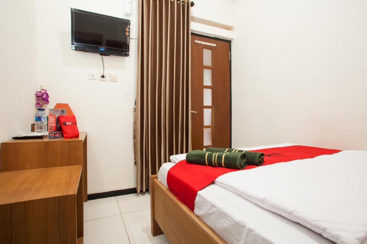 Wisma tamu Reddoorz Syariah Near Singha Merjosari Park *